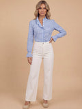 Women’s checked blouse with ruffled details